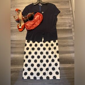 Navy blue polka dot dress. Fits dress size 10.